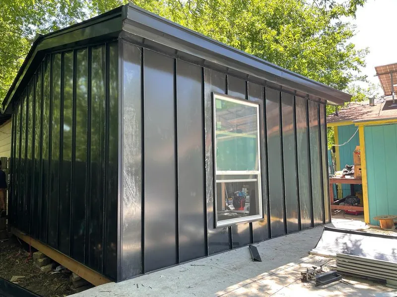 Black standing seam metal wall panels for Roof Inspection in Mendota