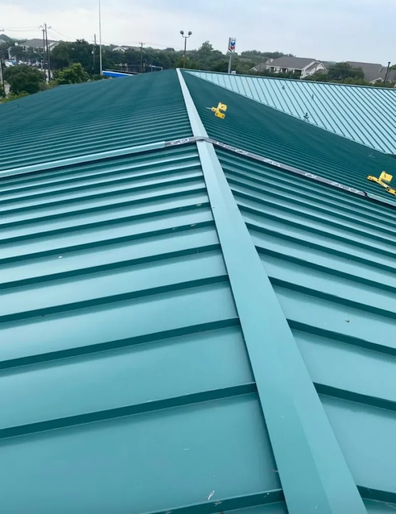 Green commercial metal roof ridge and valley for Metal Roof Repair in Mendota